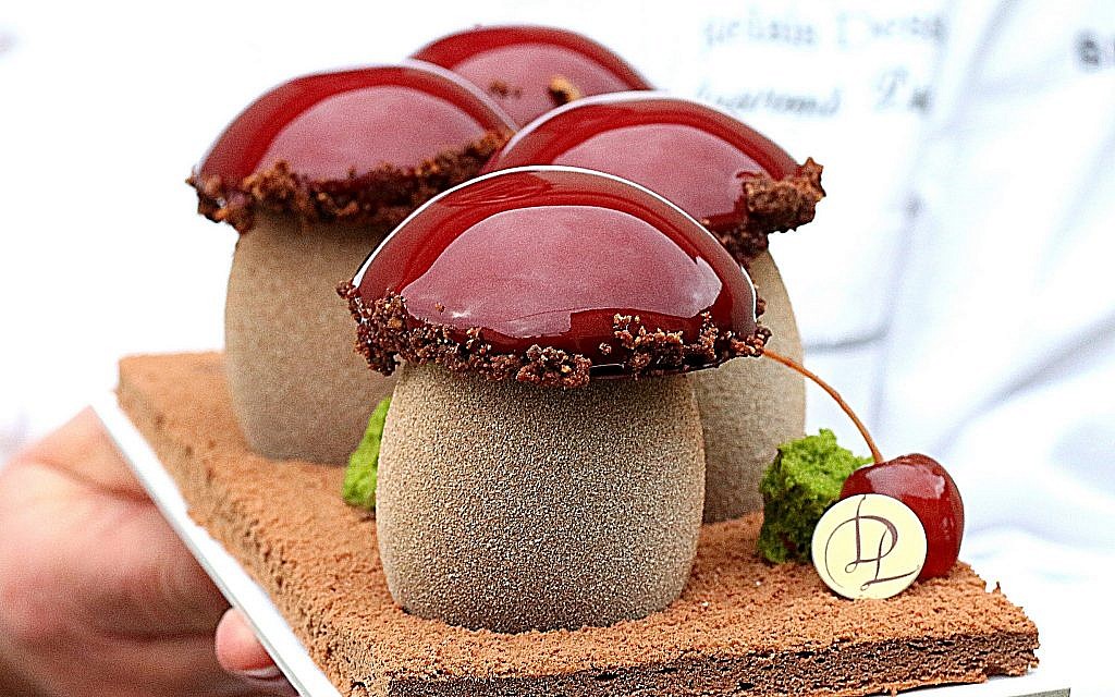 Detail of a photo by Sharon Heinrich, on a take on Black Forest cake with chocolate biscuit, cherry confit, dark chocolate mousse, vanilla chantilly and almonds streusel, by Laurent Duchene. (Sharon Heinrich/Paris Chez Sharon)