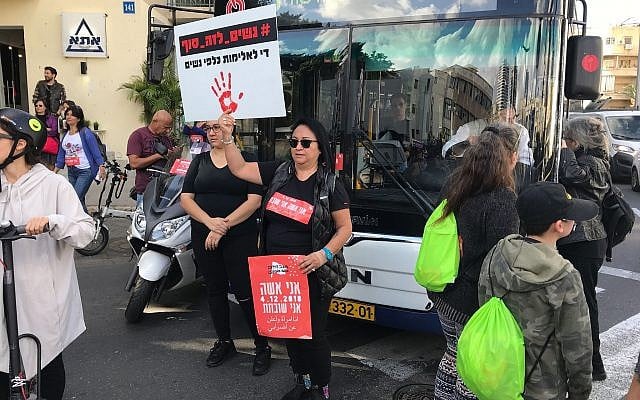 Demonstrators stop traffic on Tel Aviv's Rothschild Boulevard to protest violence against women, December 4, 2018 (Luke Tress/Times of Israel) Demonstrators stop traffic on Tel Aviv's Rothschild Boulevard to protest violence against women, December 4, 2018 (Luke Tress/Times of Israel)