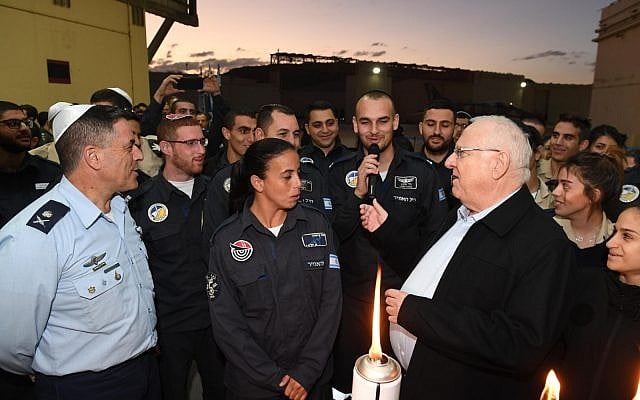 President Reuven Rivlin lights the third candle of Hanukkah with the IAF's 25th Wing at the Ramon Air Force base in southern Israel on December 4, 2018. (Mark Neiman/GPO)