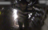 An alleged Hezbollah member walks through a tunnel dug into Israeli territory from southern Lebanon on December 4, 2018. (Screen capture: Israel Defense Forces)