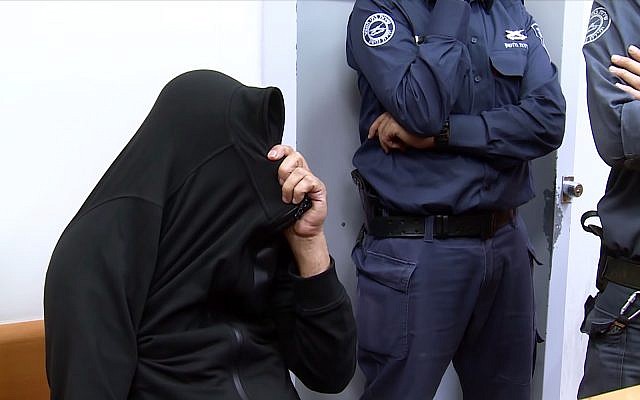 A suspect in the El Al drug smuggling case appears in court, November 26, 2018. (Screenshot/Ynet news) A suspect in the El Al drug smuggling case appears in court, November 26, 2018. (Screenshot/Ynet news)