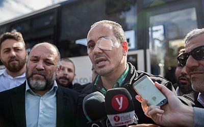 Nidal Fakih, who was attacked last week while driving a bus last week, speaks to the media during a protest of Kavim bus drivers against violence directed at them near the Knesset, December 17, 2018. Photo by Yonatan Sindel/Flash90