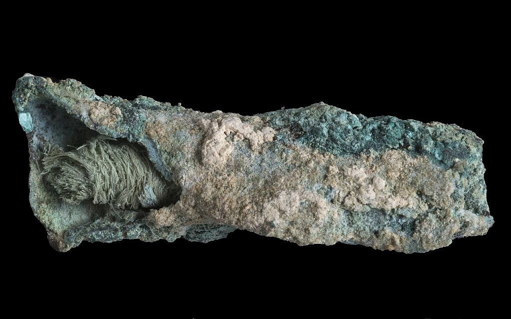 The Byzantine-period flax wick and copper casing, used to light lamps some 1,500 years ago, was discovered in the 1930s American Colt expedition to the Negev site of Shivta. (Clara Amit, Israel Antiquities Authority)