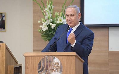 Prime Minister Benjamin Netanyahu speaks at an awards ceremony at the Shin Bet's headquarters in Tel Aviv honoring agents who excelled in intelligence operations in 2017 and 2018, on December 4, 2018. (Amos Ben Gershom/GPO)