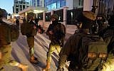 In this undated photograph, Israeli troops search for the terrorists who committed a shooting attack on a bus stop outside the Ofra settlement in the West Bank, near Ramallah, in which seven Israelis were injured, including a pregnant woman, on December 9, 2018. (Israel Defense Forces)