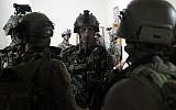 Israeli soldiers conduct raids in West Bank village of Kobar on December 31, 2018, in search of Palestinian terrorist who committed deadly shooting attack outside the Givat Assaf outpost earlier in the month. (Israel Defense Forces)