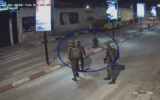 Israeli soldiers are seen walking along a Tulkarem street moments before the shooting of a 22-year-old Palestinian on December 4, 2018 (B'Tselem video screenshot)