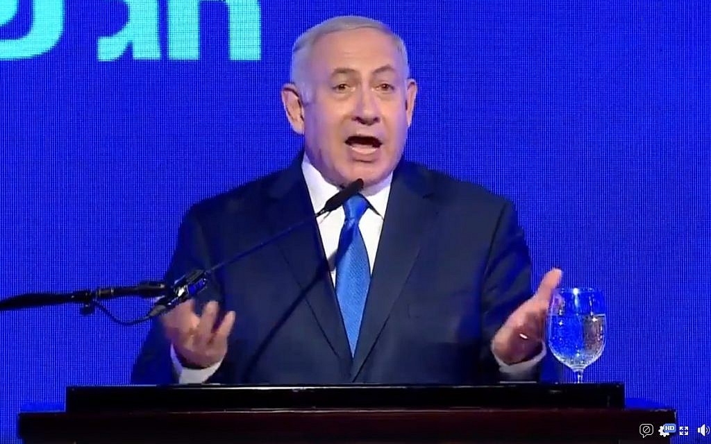 Prime Minister Benjamin Netanyahu speaks at a Likud Hanukkah event on December 2, 2018 (screen capture: Facebook) Prime Minister Benjamin Netanyahu speaks at a Likud Hanukkah event on December 2, 2018 (screen capture: Facebook)