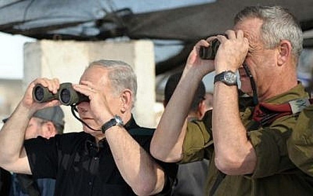 Prime Minister Benjamin Netanyahu, left, and then-IDF chief of staff Lt. Gen. Benny Gantz watch a military exercise of the army's Golani Brigade on the Golan Heights, September 11, 2012. (Avi Ohayon/GPO/Flash90) Prime Minister Benjamin Netanyahu, left, and then-IDF chief of staff Lt. Gen. Benny Gantz watch a military exercise of the army's Golani Brigade on the Golan Heights, September 11, 2012. (Avi Ohayon/GPO/Flash90)