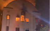 A fire burns in Beit Midrash Morasha, also known as Arthur’s Road Shul in Cape Town, South Africa on December 4, 2018 (Screenshot/YouTube)