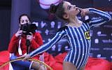 A Spanish gymnast performing in a striped outfit based on uniforms worn by prisoners at the Auschwitz concentration camp. (Royal Gymnastics Federation of Spain/Facebook via JTA)