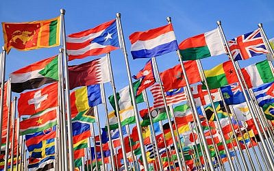 An illustrative image of diplomacy: a photo of national flags from around the world 
(123ArtistImages; iStock by Getty Images)