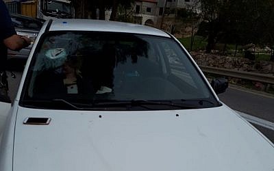An Israeli car hit by a rock during an attack near Eli in the West Bank, December 16, 2018 (Courtesy Rescuers Without Borders)