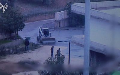 Footage released by the IDF on December 28, 2018, shows fluids the army says it used to seal cross-border attack tunnels dug by Hezbollah flowing into the southern Lebanese village of Kafr Kila. (Israel Defense Forces)