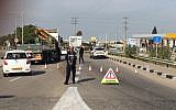 Police man a checkpoint in the northern Arab Israeli town of Umm al-Fahm after a teacher is kidnapped from a local high school by armed assailants, December 12, 2018. (Hadashot screen capture)