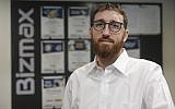 Yitzik Crombie, the CEO of Israeli start-up Bizmax, poses at the company's offices in Jerusalem, on November 21 2018. (MENAHEM KAHANA/AFP)