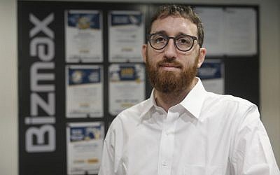 Yitzik Crombie, the CEO of Israeli start-up Bizmax, poses at the company's offices in Jerusalem, on November 21 2018. (MENAHEM KAHANA/AFP)