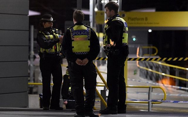 Police officers stand near a cordon at Manchester Victoria Station, in Manchester on January 1, 2019, following a stabbing on December 31, 2018. (Paul ELLIS / AFP) Police officers stand near a cordon at Manchester Victoria Station, in Manchester on January 1, 2019, following a stabbing on December 31, 2018. (Paul ELLIS / AFP)