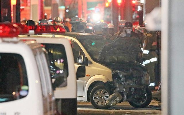 Police inspect a car whose driver rammed his vehicle into crowds on Takeshita street in Tokyo early January 1, 2019. (JIJI PRESS / JIJI PRESS / AFP) Police inspect a car whose driver rammed his vehicle into crowds on Takeshita street in Tokyo early January 1, 2019. (JIJI PRESS / JIJI PRESS / AFP)