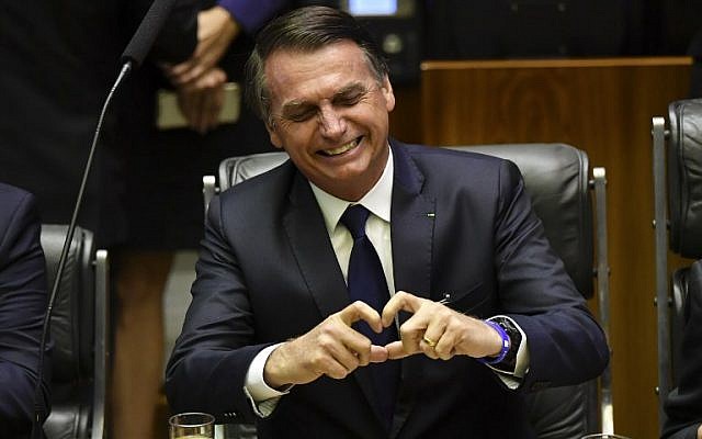 Brazil's President-elect Jair Bolsonaro gestures at the National Congress in Brasilia before he is sworn in as Brazil's new president on January 1, 2019. (Nelson Almeida/AFP) Brazil's President-elect Jair Bolsonaro gestures at the National Congress in Brasilia before he is sworn in as Brazil's new president on January 1, 2019. (Nelson Almeida/AFP)