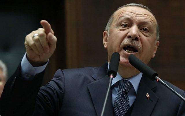 Turkey's President and leader of Turkey's ruling Justice and Development (AK) Party Recep Tayyip Erdogan makes a speech during his party's parliamentary group meeting at the Grand National Assembly of Turkey in Ankara on January 8, 2019. (Photo by Adem ALTAN / AFP) Turkey's President and leader of Turkey's ruling Justice and Development (AK) Party Recep Tayyip Erdogan makes a speech during his party's parliamentary group meeting at the Grand National Assembly of Turkey in Ankara on January 8, 2019. (Photo by Adem ALTAN / AFP)