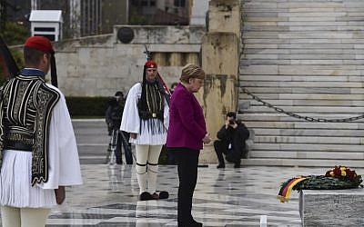 German Chancellor Angela Merkel pays tribute at the Tomb of the Unknown Soldier in Athens on January 11, 2019 (Aris Messinis/AFP)