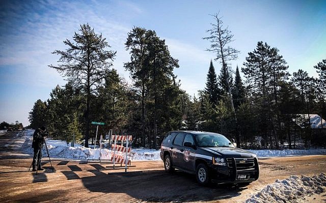 A police car blocks the road where teenager Jayme Closs was found on January 11, 2019 in Gordon, Wisconsin. (Kerem Yucel/AFP) A police car blocks the road where teenager Jayme Closs was found on January 11, 2019 in Gordon, Wisconsin. (Kerem Yucel/AFP)