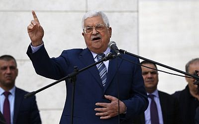 In this photo taken on November 11, 2018, PA President Mahmoud Abbas gives a speech after laying a wreath at the tomb of late Palestinian leader Yasser Arafat inside the Mukataa compound, in the the West Bank city of Ramallah. (Abbas Momani/AFP)