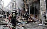 Firefighters intervene after the explosion of a bakery on the corner of the streets Saint-Cecile and Rue de Trevise in central Paris on January 12, 2019. (Thomas Samson/AFP)