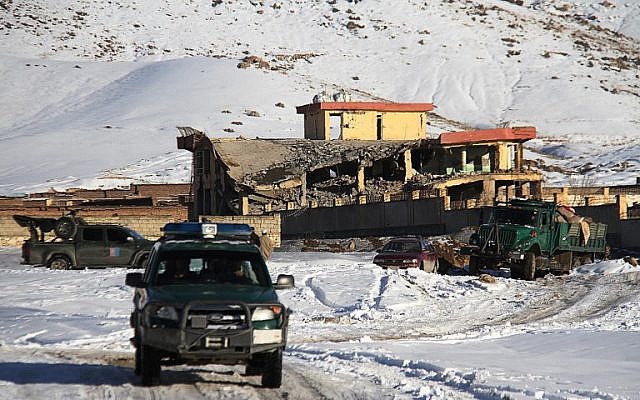 An Afghan military vehicle is seen near the attack site after a car bomb detonated on a military base in Maidan Sharar in Wardak province on January 21, 2019. (STR / AFP) An Afghan military vehicle is seen near the attack site after a car bomb detonated on a military base in Maidan Sharar in Wardak province on January 21, 2019. (STR / AFP)