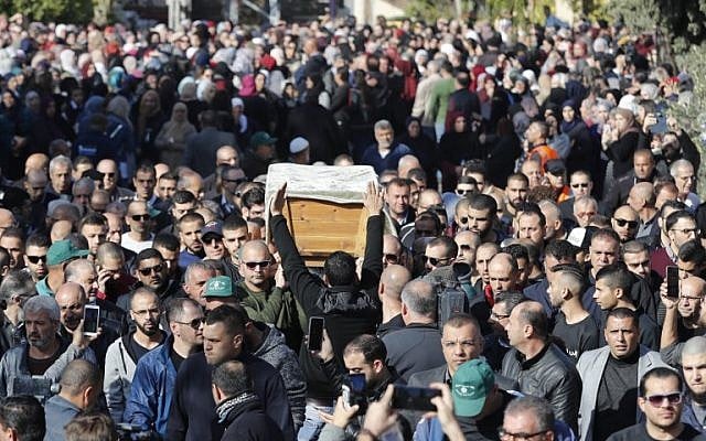 Mourners carry the coffin of Israeli student Aya Maasarwe during her funeral in the northern town of Baqa al-Gharbiya, on January 23, 2019. (Ahmad GHARABLI/AFP) Mourners carry the coffin of Israeli student Aya Maasarwe during her funeral in the northern town of Baqa al-Gharbiya, on January 23, 2019. (Ahmad GHARABLI/AFP)
