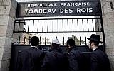 Ultra-Orthodox men at the closed gate of the Tomb of the Kings, owned and administered by the French Consulate of Jerusalem, in East Jerusalem on January 24, 2019.  (THOMAS COEX / AFP)