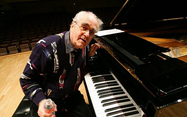 (FILES) In this photo taken on November 9, 2005 French pianist Michel Legrand poses during a rehearsal with Cuban pianist Chucho Valdes before their joint concert in Madrid (Pierre-Philippe MARCOU / AFP) (FILES) In this photo taken on November 9, 2005 French pianist Michel Legrand poses during a rehearsal with Cuban pianist Chucho Valdes before their joint concert in Madrid (Pierre-Philippe MARCOU / AFP)