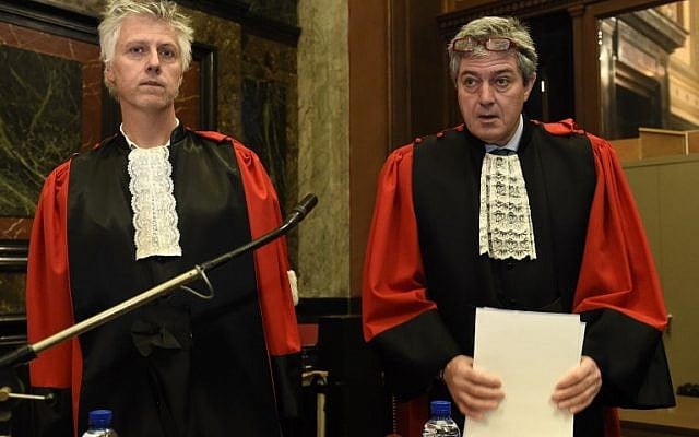 Belgian prosecutors Yves Moreau and Bernard Michel (right) look on at the Brussels Justice Palace during the trial of Frenchman Mehdi Nemmouche. (Photo by Didier LEBRUN / POOL / AFP) Belgian prosecutors Yves Moreau and Bernard Michel (right) look on at the Brussels Justice Palace during the trial of Frenchman Mehdi Nemmouche. (Photo by Didier LEBRUN / POOL / AFP)