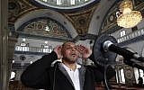 Arab Israeli bodybuilder and Muezzin Ibrahim Masri, calls to prayer at el-Jazzar mosque in the northern Israeli port city of Acre on January 29, 2019 (Photo by AHMAD GHARABLI / AFP)