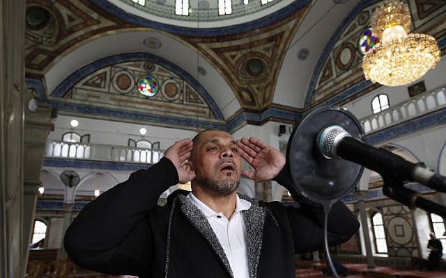 Arab Israeli bodybuilder and Muezzin Ibrahim Masri, calls to prayer at el-Jazzar mosque in the northern Israeli port city of Acre on January 29, 2019 (Photo by AHMAD GHARABLI / AFP) Arab Israeli bodybuilder and Muezzin Ibrahim Masri, calls to prayer at el-Jazzar mosque in the northern Israeli port city of Acre on January 29, 2019 (Photo by AHMAD GHARABLI / AFP)