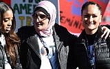 From left to right, Tamika Mallory, Linda Sarsour and Carmen Perez at the Women's March "Power to the Polls" voter registration tour launch at Sam Boyd Stadium in Las Vegas, Jan. 21, 2018. (Ethan Miller/Getty Images via JTA)