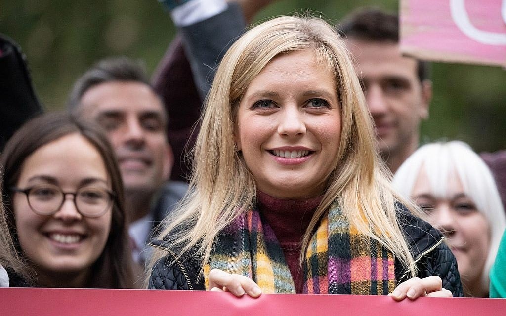 Rachel Riley poses with campaigners outside of the Houses of Parliament in London before delivering a petition to Downing Street, October 8, 2018. Riley has spoken out in recent months about her Jewish identity and the anti-Semitic abuse she has received online. (Handout/Tom Nicholson for Bauer Media via Getty Images/via JTA) Rachel Riley poses with campaigners outside of the Houses of Parliament in London before delivering a petition to Downing Street, October 8, 2018. Riley has spoken out in recent months about her Jewish identity and the anti-Semitic abuse she has received online. (Handout/Tom Nicholson for Bauer Media via Getty Images/via JTA)