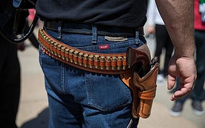 The Pittsburgh shooting has sparked a debate on bringing guns into synagogue. (Loren ElliottAFP/Getty Images/via JTA)