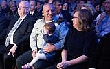 Outgoing IDF chief Gadi Eisenkot sits with his wife, Chana, and granddaughter at a farewell ceremony in the army's Tel Aviv headquarters on January 13, 2019. (Israel Defense Forces)