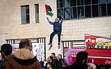Palestinians protest against a government tax hike in Ramallah, West Bank, December 12, 2018. (Luke Tress/Times of Israel)
