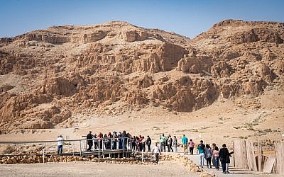 Visitors at the Qumran archaeological site, January 22, 2019. (Luke Tress/Times of Israel)