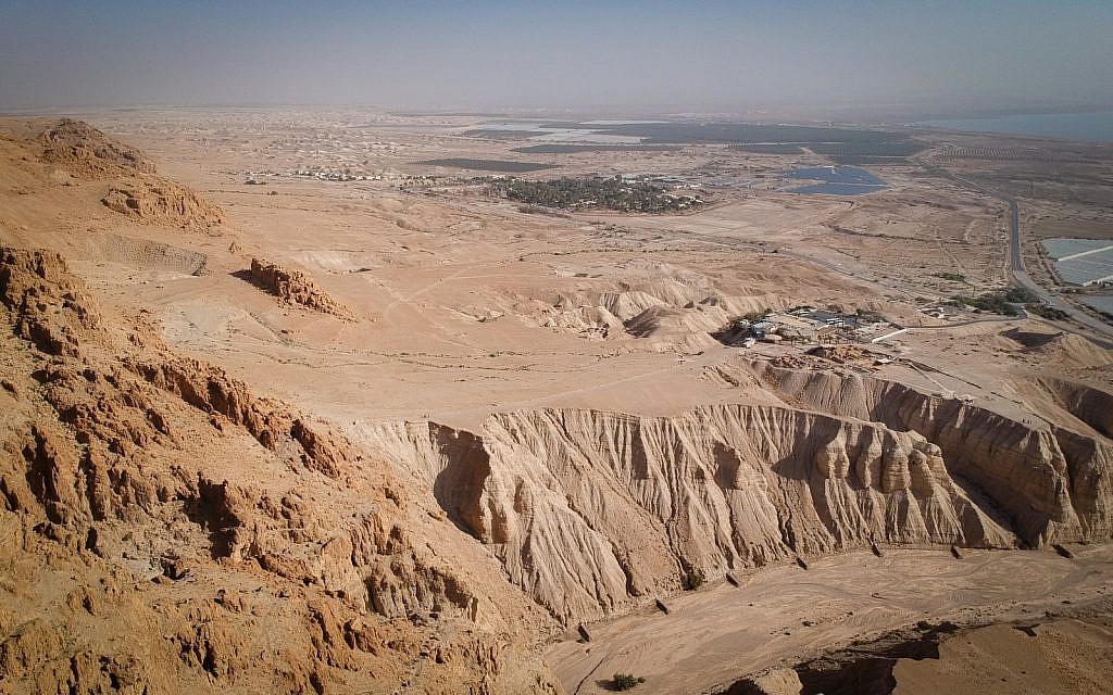 A view of the Qumran archaeological site from a recently excavated Dead Sea Scroll cave above, January 22, 2019. (Luke Tress/Times of Israel)