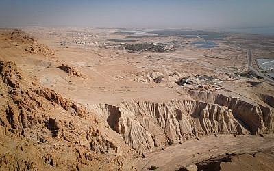 A view of the Qumran archaeological site from a recently excavated Dead Sea Scroll cave above, January 22, 2019. (Luke Tress/Times of Israel)