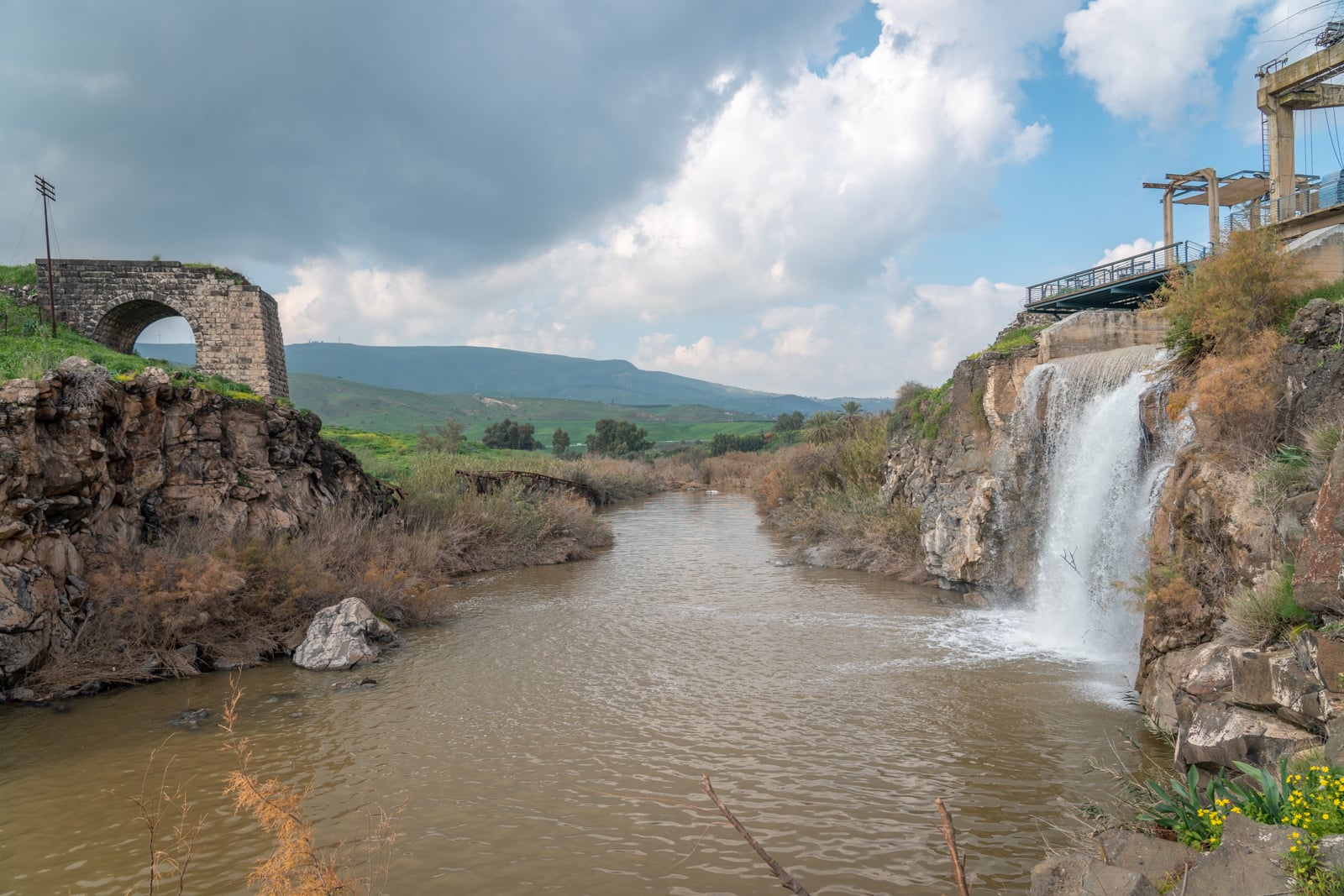 The remains of an Ottoman bridge and 1930s power plant on the Jordan River near the Island of Peace, January 29, 2019. (Luke Tress/Times of Israel) The remains of an Ottoman bridge and 1930s power plant on the Jordan River near the Island of Peace, January 29, 2019. (Luke Tress/Times of Israel)