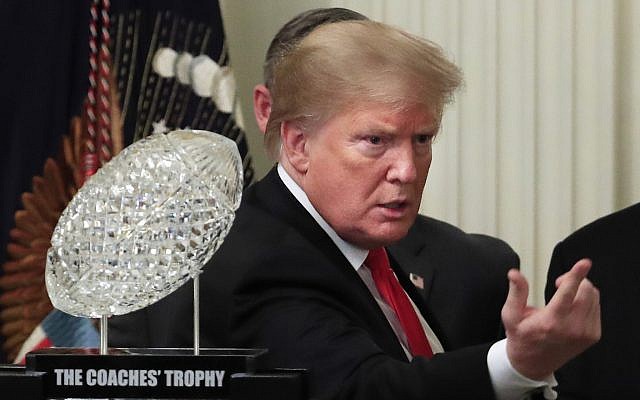US President Donald Trump calls a guest to the stage during a ceremony welcoming the 2018 college football playoff National Champion Clemson Tigers to the White House in Washington, January 14, 2019. (AP Photo/Manuel Balce Ceneta) US President Donald Trump calls a guest to the stage during a ceremony welcoming the 2018 college football playoff National Champion Clemson Tigers to the White House in Washington, January 14, 2019. (AP Photo/Manuel Balce Ceneta)