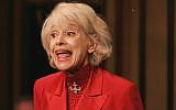In this Oct. 18, 2005 file photo, Carol Channing performs during her one woman show,"The First 80 Years are the Hardest," at the cabaret Feinstein's at the Regency in New York.  Channing, whose career spanned decades on Broadway and on television has died at age 97. Publicist B. Harlan Boll says Channing died of natural causes early Tuesday, Jan. 15, 2019 in Rancho Mirage, Calif.  (AP Photo/Richard Drew)