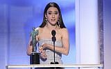 Rachel Brosnahan accepts the award for outstanding performance by a female actor in a comedy series for "The Marvelous Mrs. Maisel" at the 25th annual Screen Actors Guild Awards at the Shrine Auditorium & Expo Hall on Sunday, Jan. 27, 2019, in Los Angeles. (Photo by Richard Shotwell/Invision/AP)