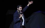 Comedian Hasan Minhaj performs on stage during the 11th Annual Stand Up for Heroes benefit on Tuesday, Nov. 7, 2017, in New York. ( Brent N. Clarke/Invision/AP)