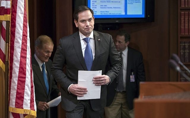 Sen. Marco Rubio (Republican- Florida), center, arrives for a news conference at the Capitol in Washington, March 7, 2018. (J. Scott Applewhite/AP) Sen. Marco Rubio (Republican- Florida), center, arrives for a news conference at the Capitol in Washington, March 7, 2018. (J. Scott Applewhite/AP)